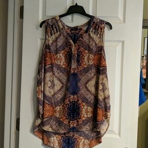 Like new, sleeveless blouse with matching cartigan
